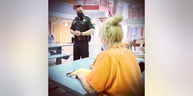 Sheriff Chris Swanson visits inmates.