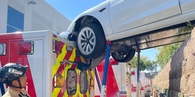 The supported the vehicle with poles until it could be removed.