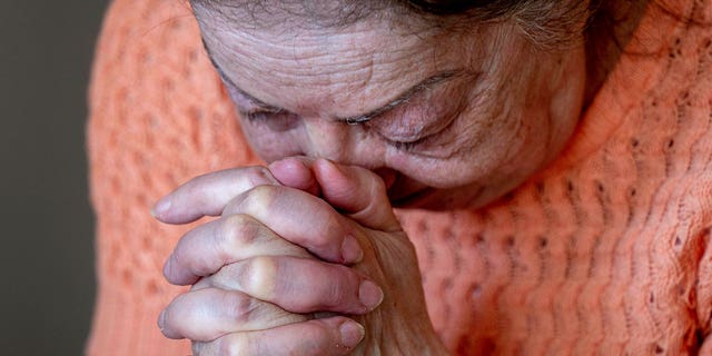 Ukrainian Holocaust survivor Tatyana Zhuravliova reacts during an AP interview in an old people's home in Frankfurt, Germany, Sunday, March 27, 2022. 