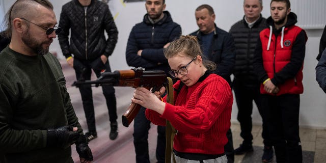Ukrainian civilians receive weapons training in Lviv, Ukraine, March 19, 2022.