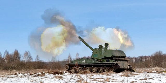 In this photo taken from video provided by the Russian Defense Ministry Press Service on Tuesday, Feb. 15, 2022, a self-propelled artillery mount fires at the Osipovichi training ground during the Union Courage-2022 Russia-Belarus military drills in Belarus.