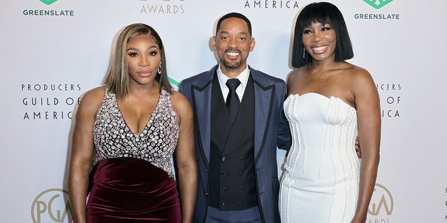 Serena Williams, left, Will Smith and Venus Williams attend the 33rd Annual Producers Guild Awards on March 19, 2022, in Los Angeles, California.