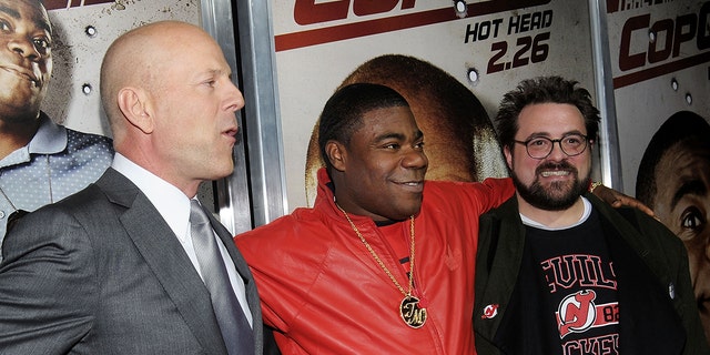 Bruce Willis, Tracy Morgan and director Kevin Smith attend the premiere of "Cop Out" on Feb. 22, 2010 in New York City.  