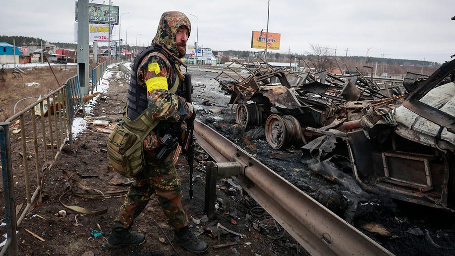 Man following Russian invasion in Ukraine