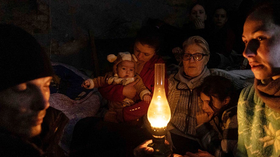 Ukrainian civilians in a bomb shelter 