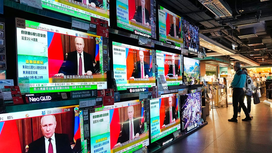 Russia's Putin on multiple TV screens 