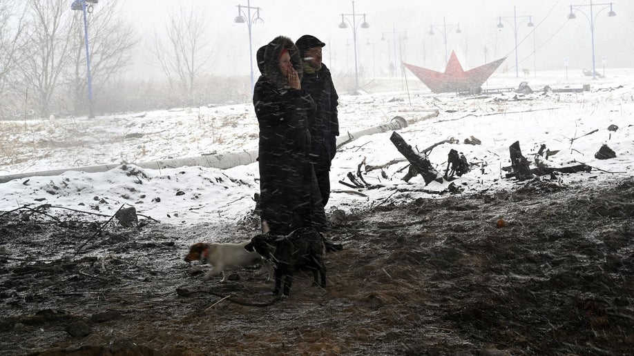 Man and woman flee Ukraine