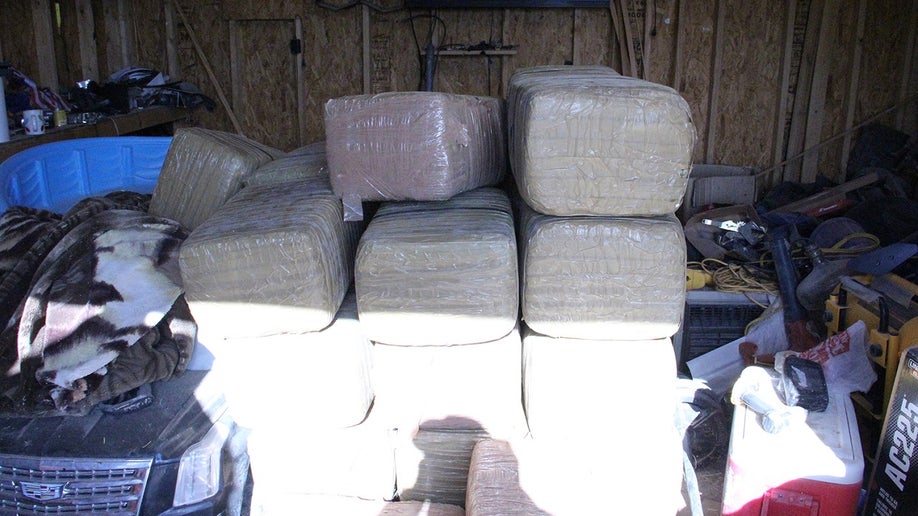 Image provided by ICE shows bales of evidence recovered from Gilberto Morales' 160-acre ranch