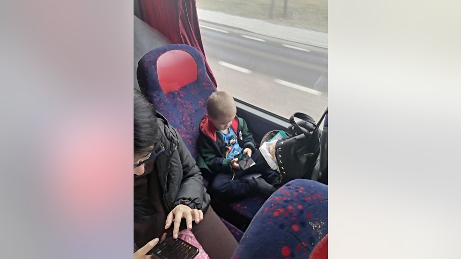 Ukrainian boy on Gnedojute's bus (Credit: Ginture Gnedojute)