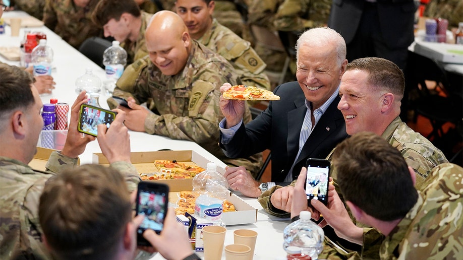 President Biden visits with members of the 82nd Airborne Division at the G2A Arena, Friday, March 25, 2022, in Jasionka, Poland. (AP Photo/Evan Vucci)