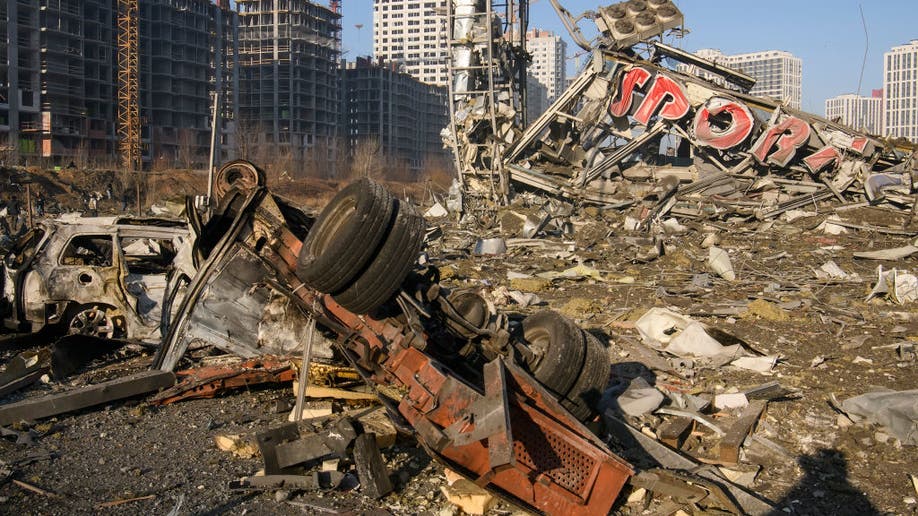 Mangled cars shown in aftermath of Kyiv bombing