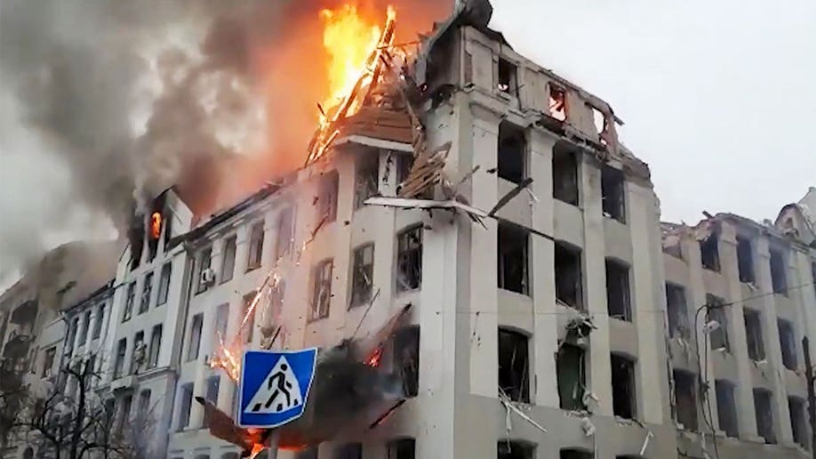 Ukrainian State Emergency Service workers rescuing those caught in missile strikes in Central Kharkiv