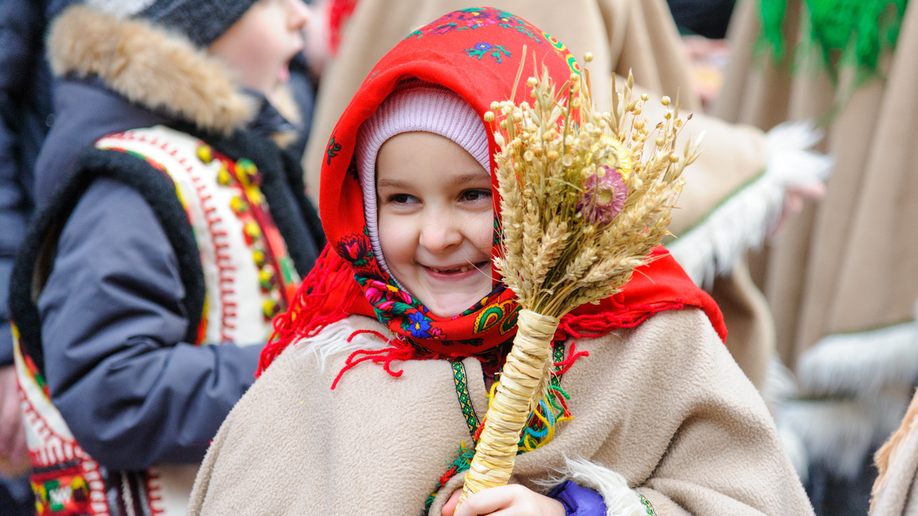 Ukrainian girl holding wheat Christmas