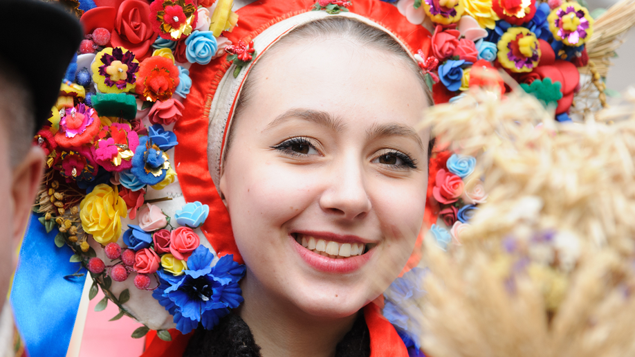 Ukrainian woman parade wheat