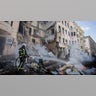 Firefighters extinguish an apartment house after a Russian rocket attack in Kharkiv, Ukraine's second-largest city, Ukraine, Monday, March 14, 2022.