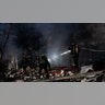 Emergency crews respond after a missile landed near Kyiv's TV Tower in Ukrainian capital, Kyiv on March 01, 2022.