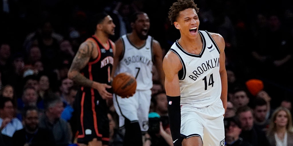 Brooklyn Nets forward Kessler Edwards reacts as his team takes on a 26  point deficit in the first quarter of an NBA basketball game against the  Boston Celtics, Tuesday, Feb. 8, 2022