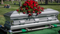 daily news top stories today Casket getting ready to be lowered at cemetery (iStock)