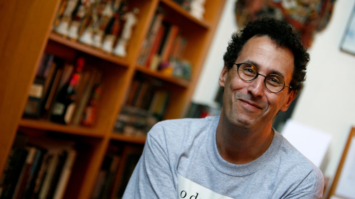 American playwright Tony Kushner smiles during an interview