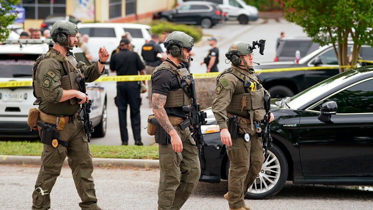 Authorities stage outside Columbiana Centre mall in Columbia, S.C., following a shooting, Saturday, April 16, 2022. (AP Photo/Sean Rayford)