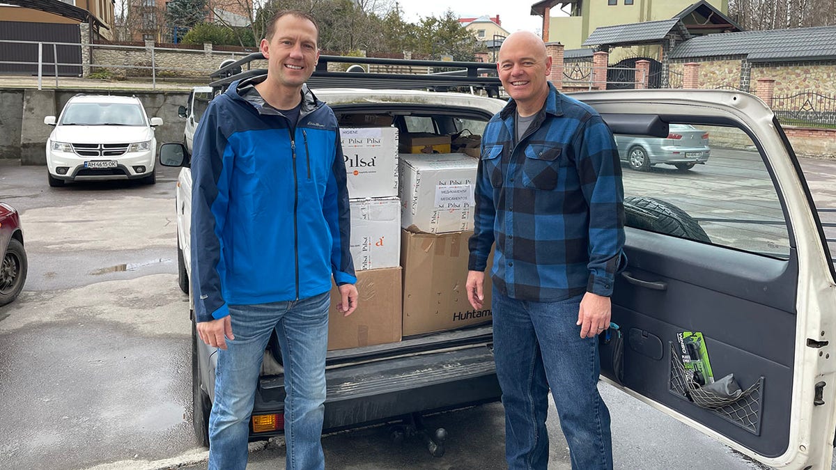 Dr. Shawn Galbraith and Dr. Daniel Smith prepare to deliver a load of donated medical supplies into Ukraine.