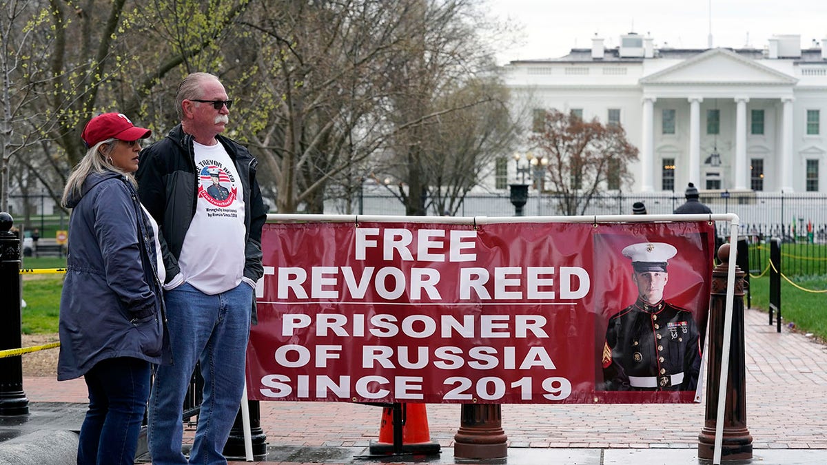 Joey and Paula Reed, parents of U.S. Marine Corps veteran and Russian prisoner Trevor Reed, stand in Lafayette Park near the White House on March 30, 2022, in Washington. 