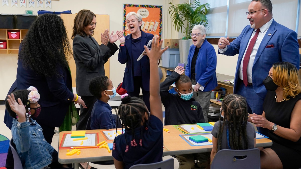 Harris, Granholm, and Yellen in a classroom