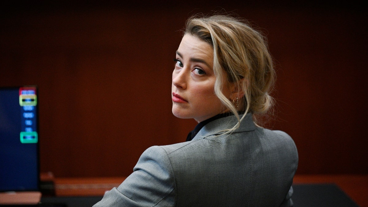 US actress Amber Heard is seen inside the courtroom during the $50 million Depp vs Heard deformation trail at the Fairfax County Circuit Court April 12, 2022, in Fairfax, Virginia.