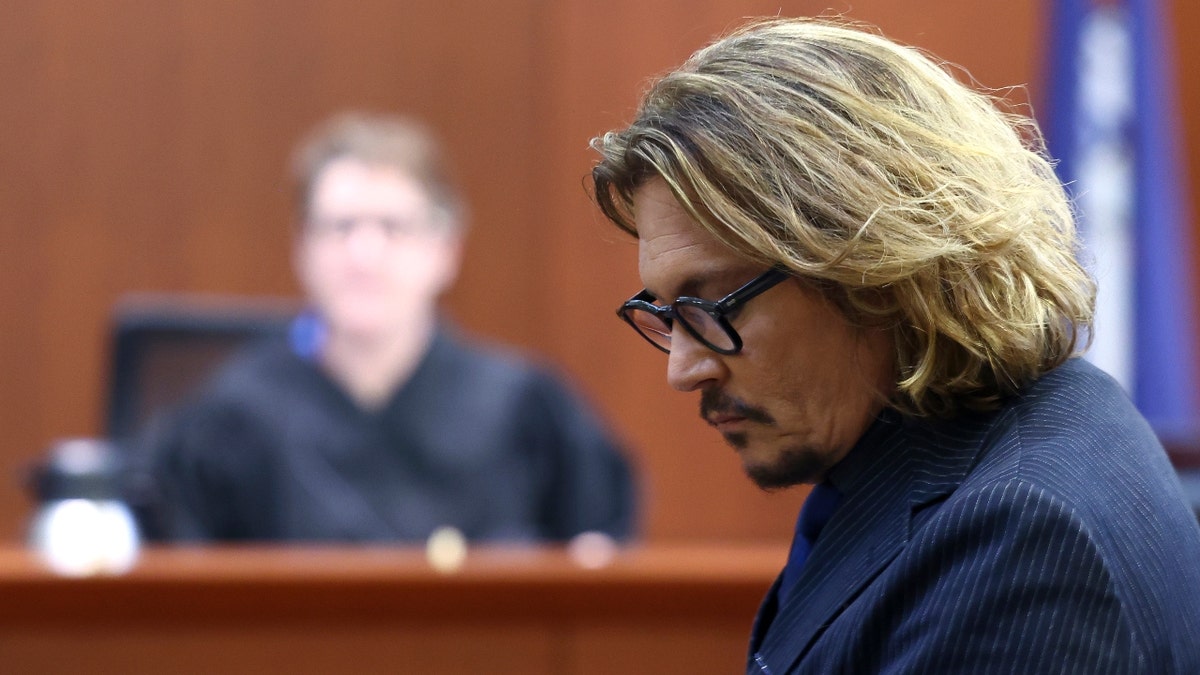 Actor Johnny Depp attends his defamation trial against his ex-wife Amber Heard at the Fairfax County Circuit Courthouse in Fairfax, Virginia, U.S., April 13, 2022.