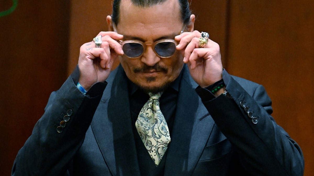 US actor Johnny Depp testifies during his defamation trial in the Fairfax County Circuit Courthouse in Fairfax, Virginia, on April 19, 2022.