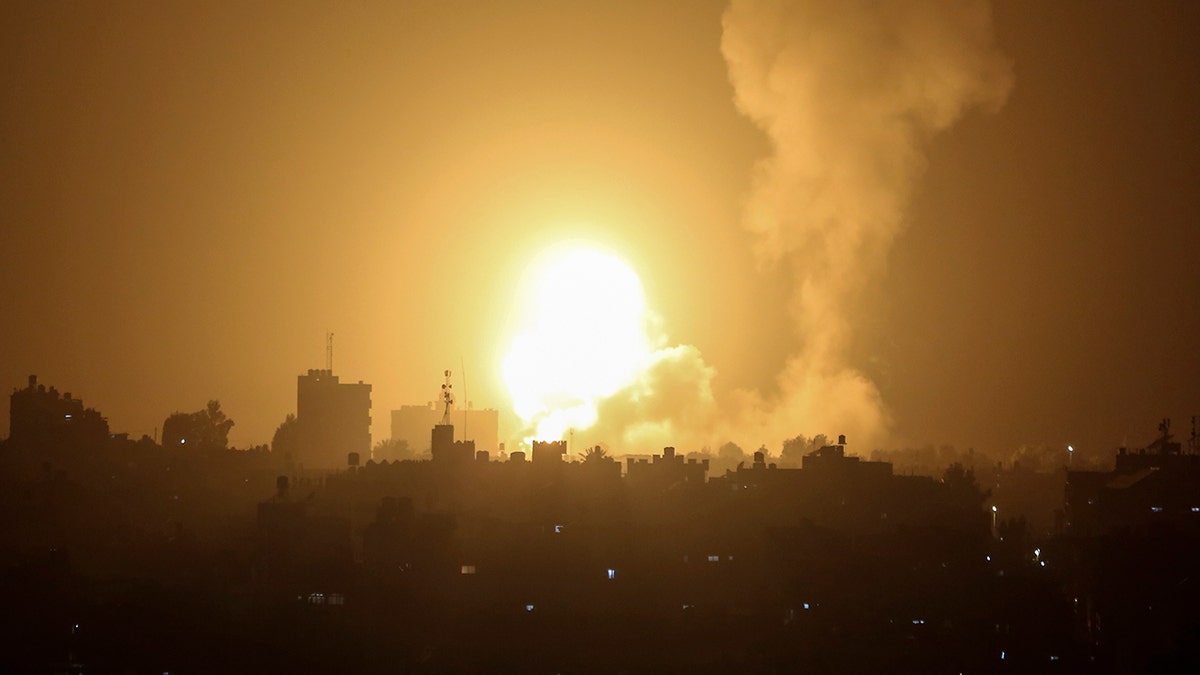 An explosion is caused by Israeli airstrikes on a Hamas military base in town of Khan Younis, southern Gaza Strip, April 19, 2022.