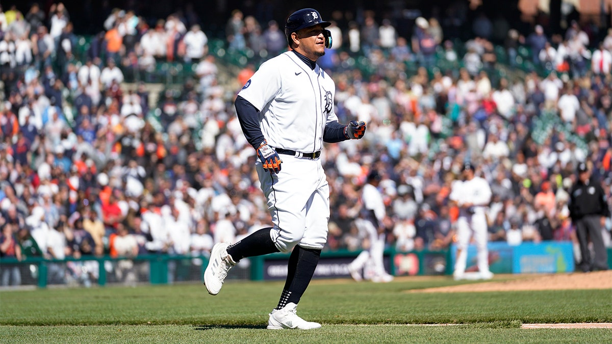 Detroit Tigers' Miguel Cabrera runs to first base after being intentionally walked against the New York Yankees in the eighth inning of a baseball game in Detroit, Thursday, April 21, 2022. 