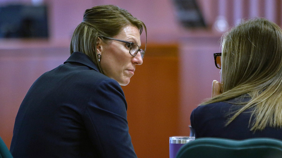 Deputy prosecuting attorney, Katelyn Farley confers with a colleague during a break in testimony on the second day of the rape trial of former Idaho state Rep. Aaron von Ehlinger at the Ada County Courthouse, Wednesday, April 27, 2022, in Boise, Idaho. (Brian Myrick/The Idaho Press-Tribune via AP, Pool)