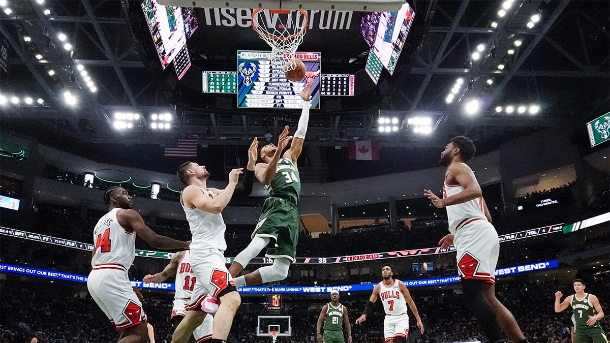 Milwaukee Bucks' Giannis Antetokounmpo shoots during the first half of Game 5 of an NBA basketball first-round playoff series Wednesday, April 27, 2022, in Milwaukee.