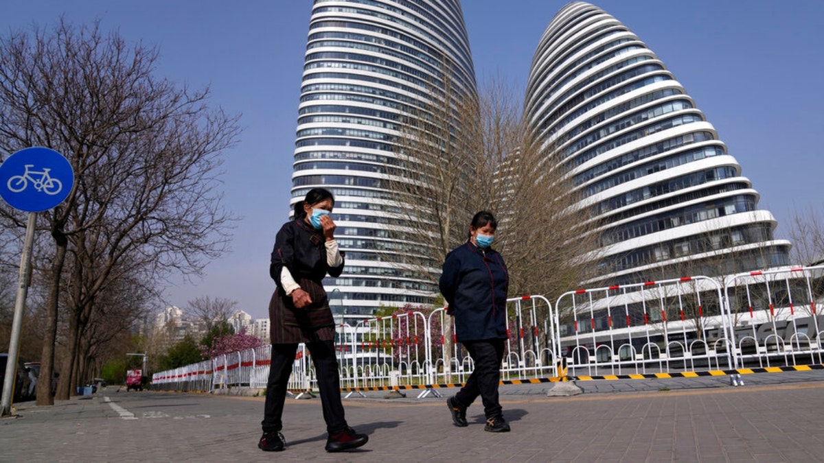 Women wearing masks in Beijing, China