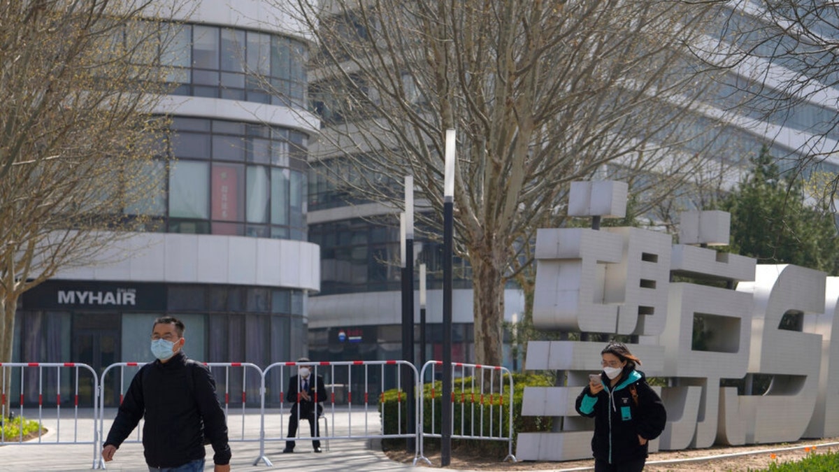 Residents wearing COVID-19 masks in Beijing, China