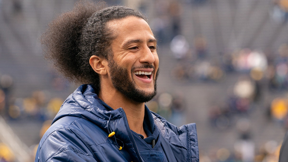 Colin Kaepernick interacts with fans before the Michigan spring football game at Michigan Stadium on April 2, 2022 in Ann Arbor, Michigan.  Kaepernick was honorary captain for the game.