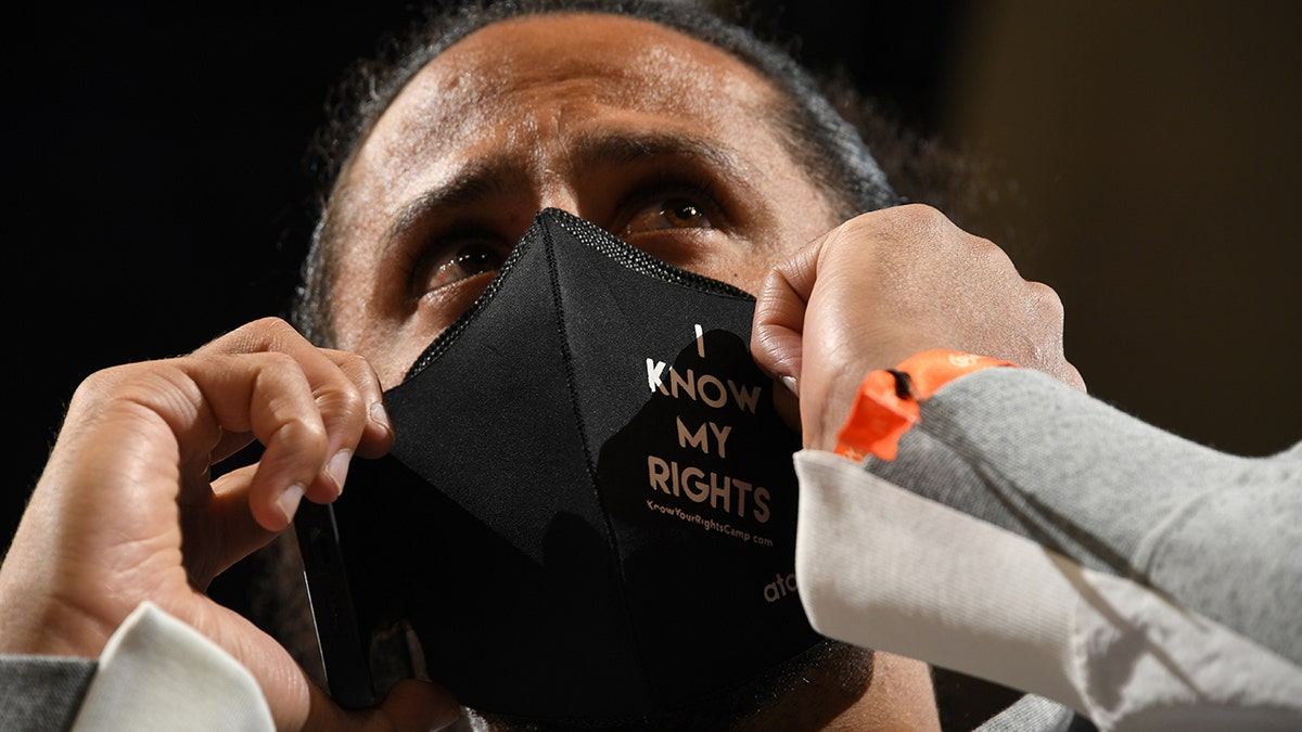 Colin Kaepernick attends the game between the Los Angeles Lakers and the Phoenix Suns on March 13, 2022 at Footprint Center in Phoenix, Arizona.