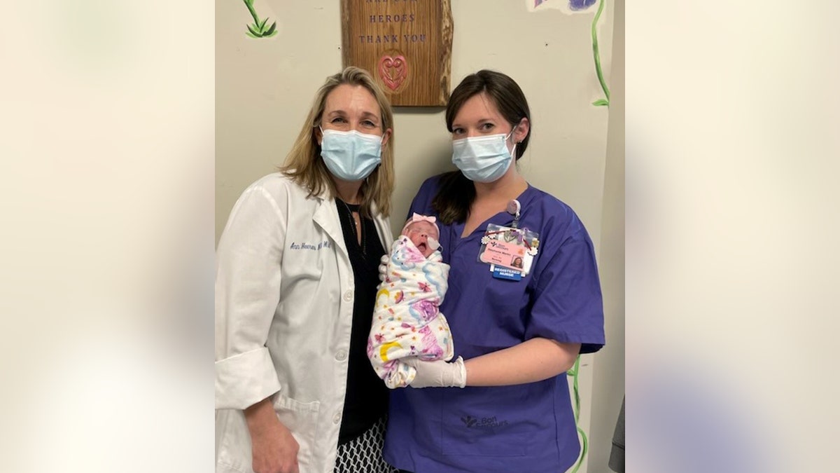 Dr. and RN with Baby Grace