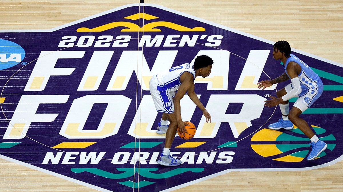 Jeremy Roach #3 of the Duke Blue Devils dribbles against Caleb Love #2 of the North Carolina Tar Heels in the first half of the game during the 2022 NCAA Men's Basketball Tournament Final Four semifinal at Caesars Superdome on April 02, 2022 in New Orleans, Louisiana.