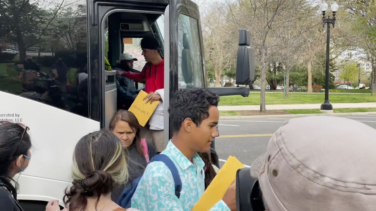 Another migrant bus from Texas arrives in Washington, D.C with people seen exiting bus 