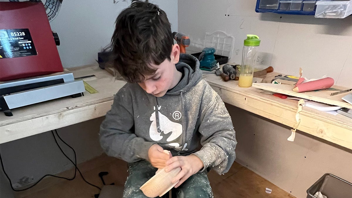 Gabriel Clark doing woodwork