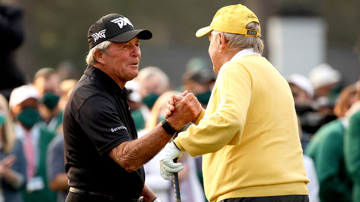 Honorary starter and Masters champion Gary Player of South Africa shakes hands with honorary starter and Masters champion Jack Nicklaus on the first tee during the opening ceremony prior to the start of the first round of the Masters at Augusta National Golf Club on April 08, 2021 in Augusta, Georgia.