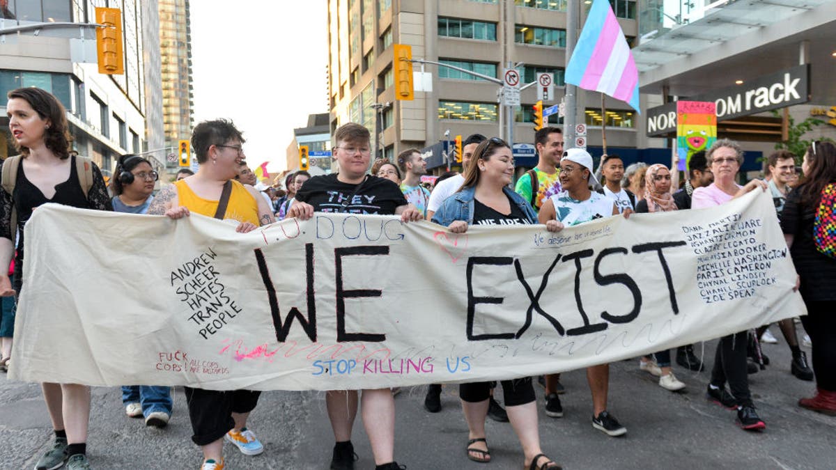 Spectators displayed their support toward transgender and non-binary people during a Trans March in Toronto, Ontario, on June 21, 2019.