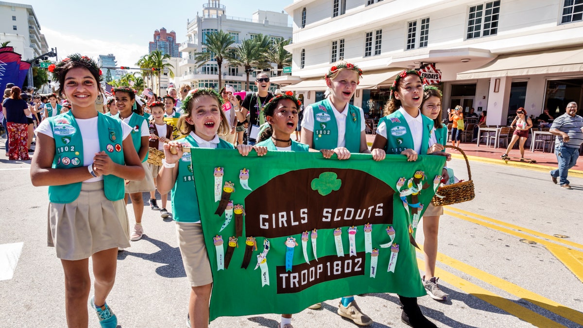 Girl Scouts marching