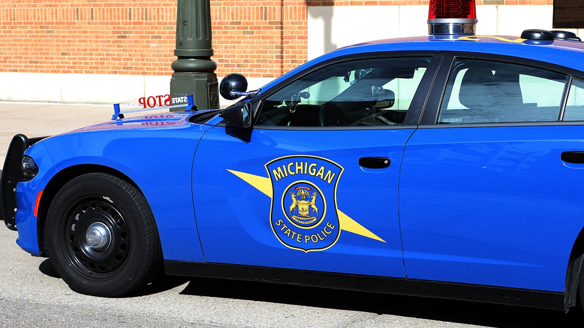 A Michigan State Police vehicle sits parked outside Comerica Park in Detroit, Michigan on September 27, 2019. 