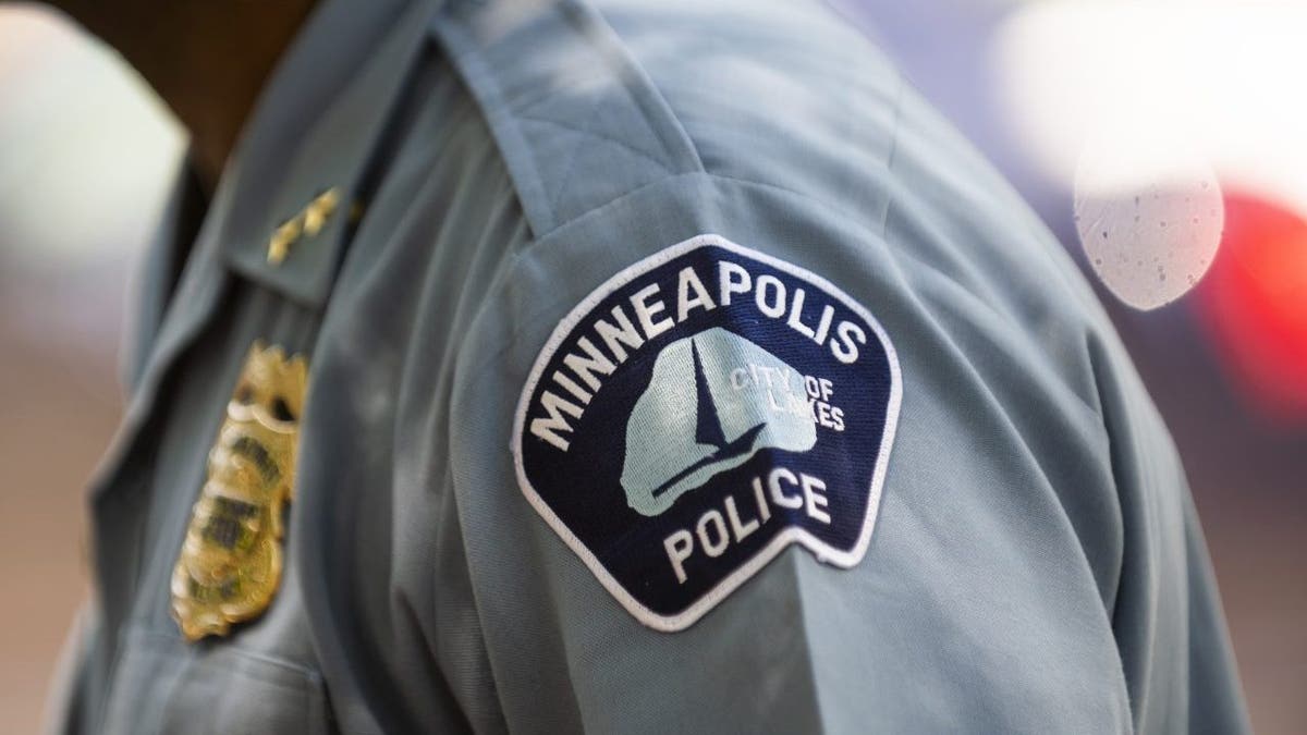 Police Deputy Chief Art Knight speaks with people gathered near a crime scene on June 16, 2020, in Minneapolis, Minnesota.