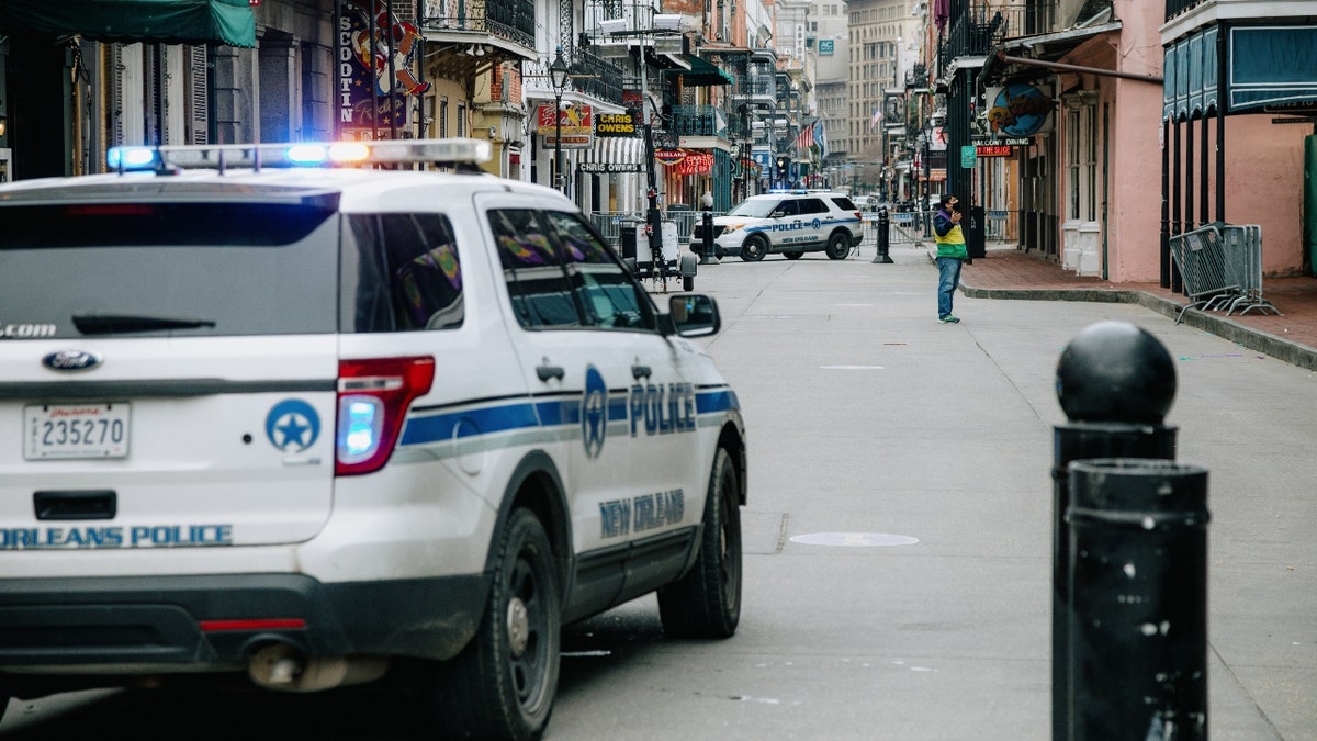 Police vehicles block access to Bourbon Street in New Orleans, Louisiana, U.S., on Tuesday, Feb. 16, 2021. Since 1857, Mardi Gras celebrations in New Orleans have been called off only 14 times, because of war, mob violence, or labor disputes. Not even the last great pandemic could quell the street parades. Mark the history books: This year will be the 15th. Photographer: Bryan Tarnowski/Bloomberg