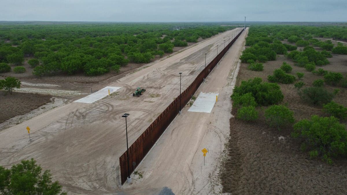 A photo taken on March 30, 2021 shows a general view of an unfinished section of a border wall that former US president Donald Trump tried to build near the southern Texas border city of Roma. - The 11,000 inhabitants of the Texas border town Roma have been living with illegal immigrants for decades. Many have mixed feelings about the new arrivals