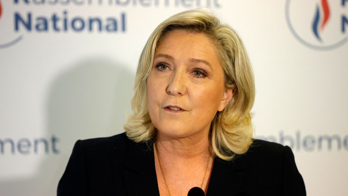 French far-right Rassemblement National (RN) party's leader and member of parliament Marine Le Pen speaks to the press at the party's headquarters after the first results in the second round of the French regional elections in Nanterre on June 27, 2021.